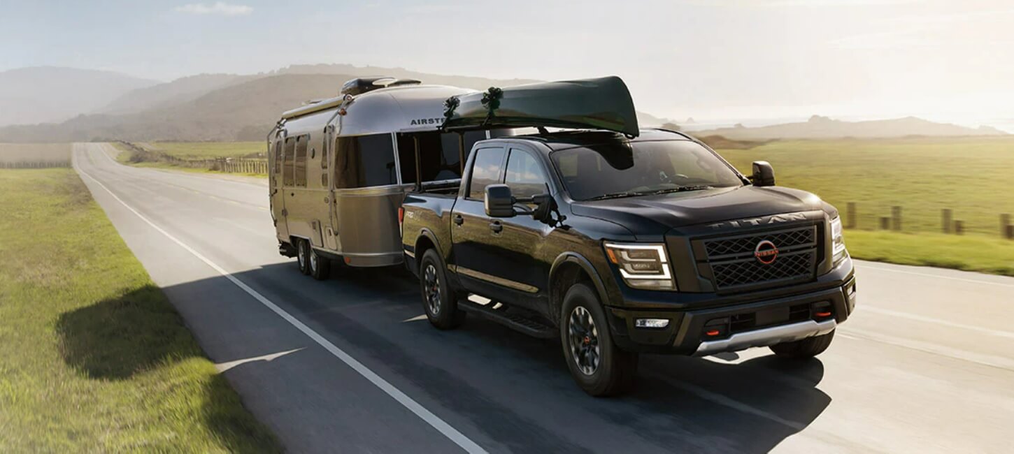 2023 Nissan Titan towing camper trailer